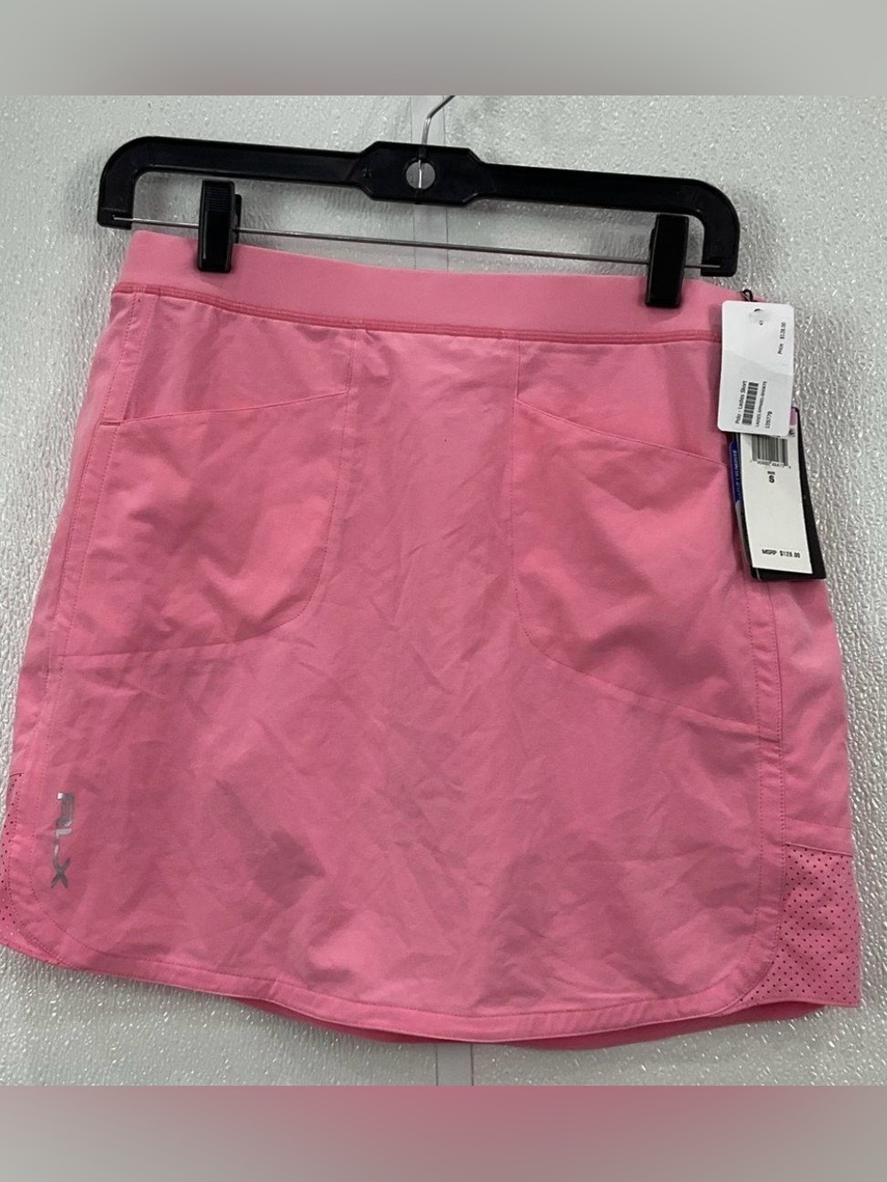NEW RLX Golf Perforated Stretch
Skort Neon Pink Retail $128.00